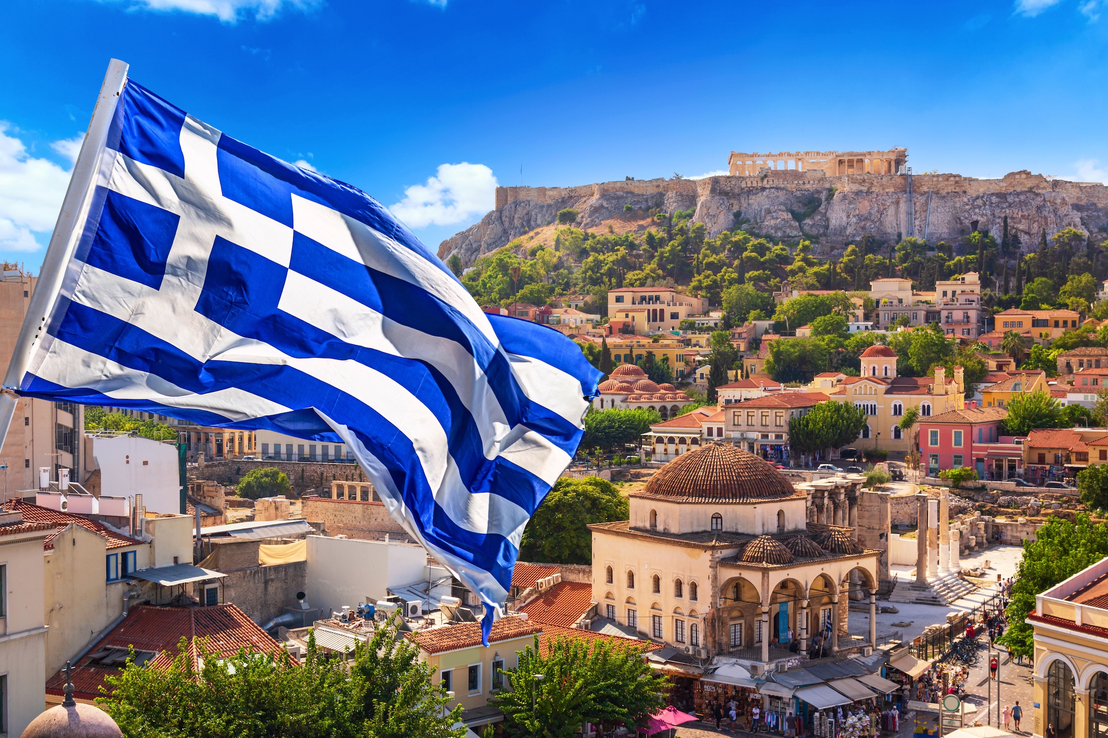 Skyline of Athens with Monastiraki square and Acropolis hill during sunset. Athens, Greece